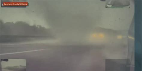 Driver dodges tornado on interstate