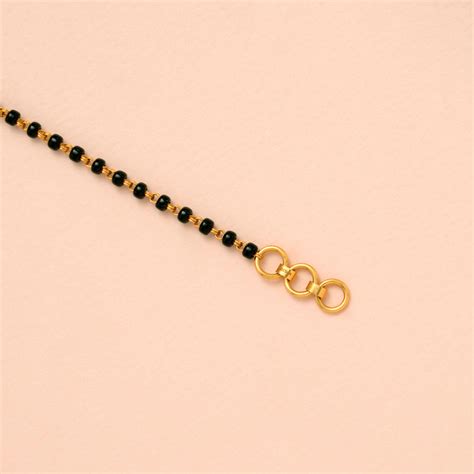 Elite Infinity Black Beads Gold Bracelet | Sri Anu Mdu – Sri Anu Jewellers