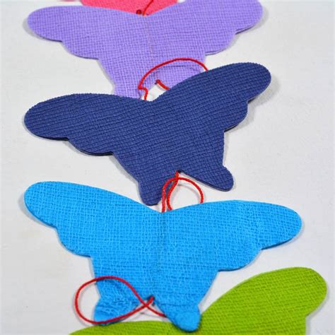Paper Thread Butterfly And Flower Garland – Auroville Online Store