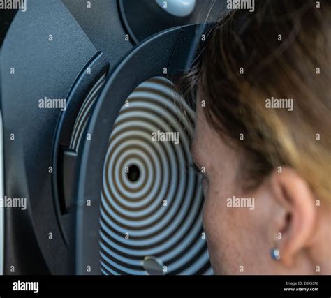 visual examination of the eyes of a young woman at the eye clinic Stock Photo - Alamy