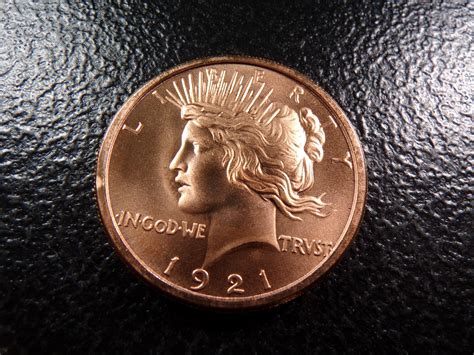 At Auction: 1 oz .999 Fine COPPER 1921 Peace Silver Dollar Designed Coin