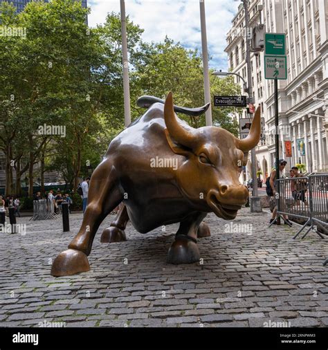 New York, USA - July 21st, 2023: The charging bull bronze sculpture, a ...