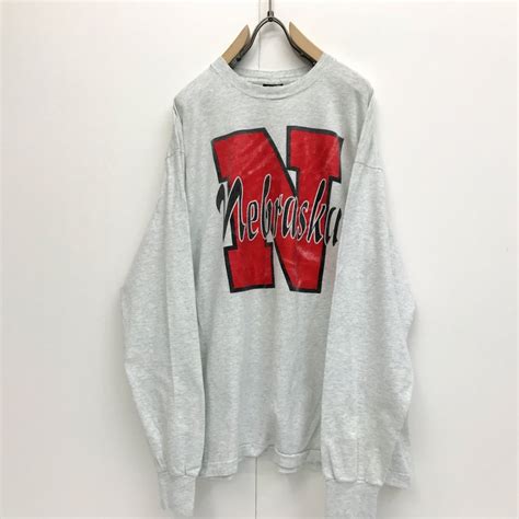 WARNER BROTHERS SPACE JAM 90年代 USA製 NEBRASKA CORN HUSKERS 長袖Tシャツ ロンT ...