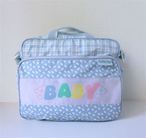 New Diaper Bag CUTIE PIE filled with HUGGIES swimpants and disposable pads