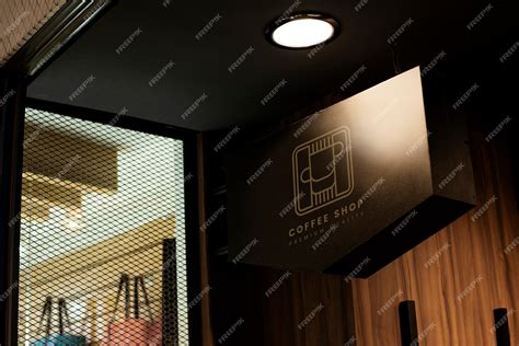 Black mockup sign in a shop | Premium PSD
