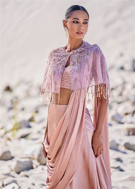 Beige Satin Draped Saree With Pleated Blouse And Embroidered Cape