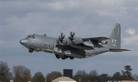 A U.S. C-130 Hercules cargo plane, prepares to depart Fort McCoy, Wis ...