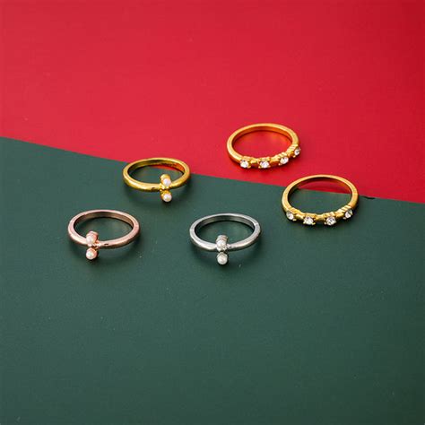 Scintillare by Sukkhi Exclusive Gold & Rhodium Plated Rings Combo for ...