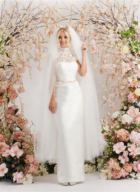 Elegant lace and mikado ivory wedding dress with cap sleeves and belt