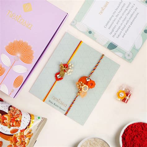 Orange And Gold Peacock Rakhi Gift Set Online - Premium Gift Hamper ...