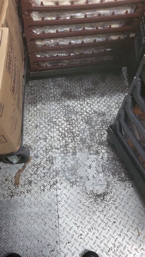 Freezer floor has a load of buildup. How do you clean it without cooler ...