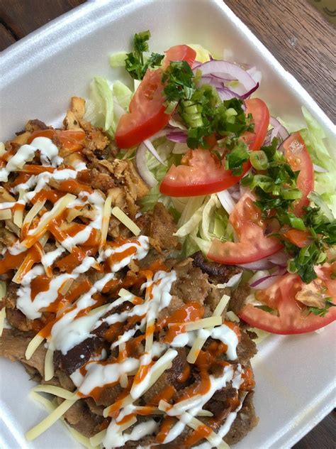 Falafels served with selection of large tabouli, salad and sauces