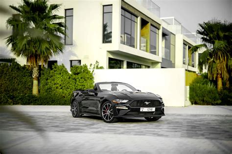 Rent Ford Mustang Black in Dubai - Convertible - Octane.Rent