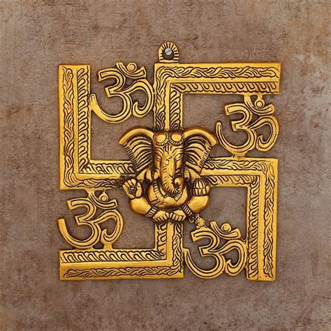 eCraftIndia Lord Ganesha on Om Swastik Metal Golden Wall Hanging ...