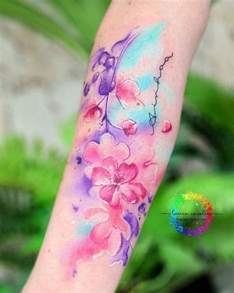 https://outsons.com/wp-content/uploads/2021/12/Abstract-Watercolor-Flower-Tattoos-2-585x732.jpg