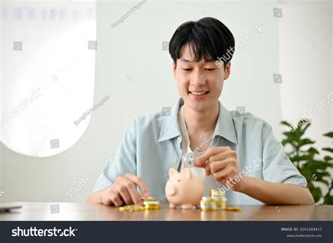 2,174 Asian Guy Saving Money Images, Stock Photos, 3D objects ...