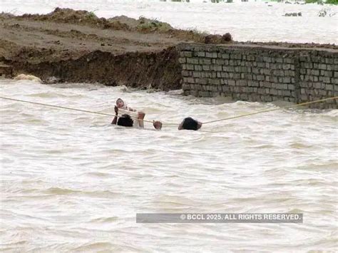 Pics: Floods across India cause devastation - Heavy rain causes water ...