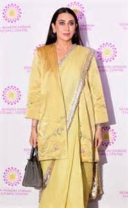 Karisma Kapoor builds her butter-yellow Anavila sari into a layered set ...