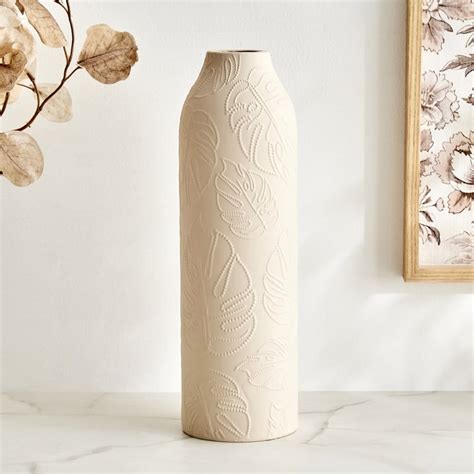 Buy Lets Garden Terracotta Embossed Vase from Home Centre at just INR 699.0