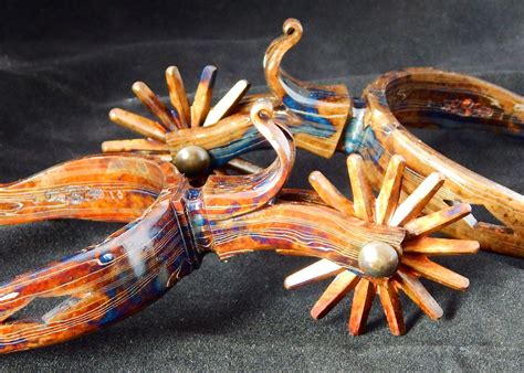 Forged color casehardened Damascus one piece spurs by Kevin A Willey ...
