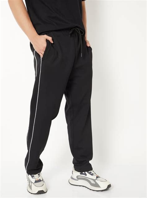 Buy Men Side Stripes Sports Track Pants Online at just Rs. 1299.0 ...