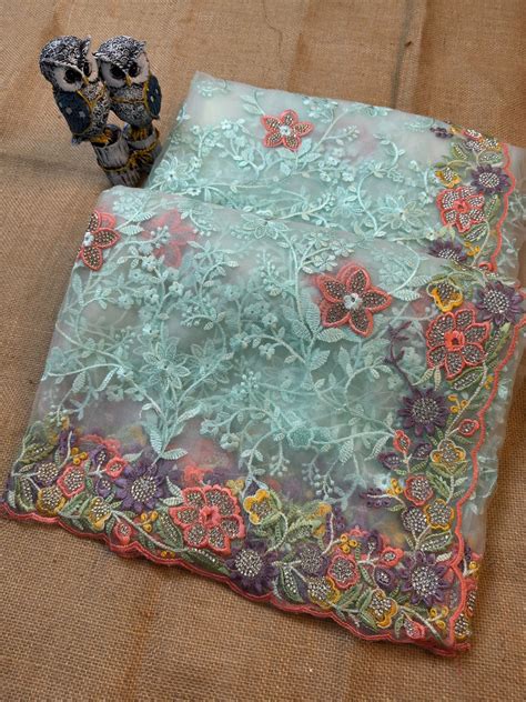 Premium Floral Embroidered Net Saree with Multicolor Border Work ...