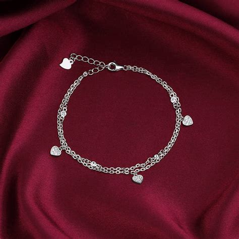 Kriti Sanon Silver Zircon Heart Charm Bracelet – GIVA