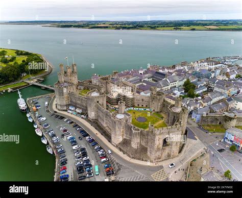 Aerial view of the ancient Caernarfon Castle in North Wales Stock Photo ...