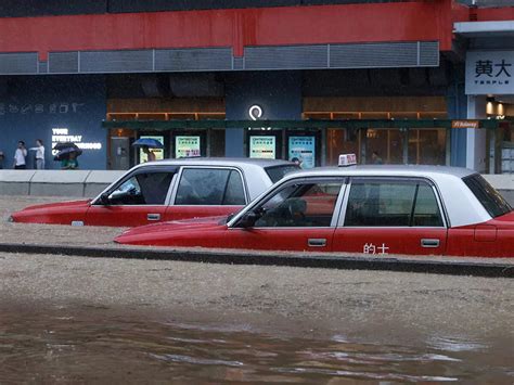 Hong Kong comes to a standstill due to severe flooding following record ...