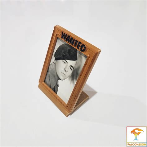 Wanted! Dead or Alive! Just a nice photoframe for 47mmx65mm sized mugshots / passport photos ...