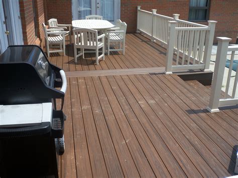 Trex Spiced Rum Deck with Grill and Chairs