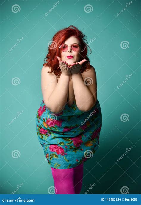 Plus-size Overweight Redhead Lady in Fashion Sunglasses Send a Kiss on ...