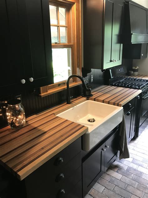 Black Kitchen Cabinets with Butcher Block Countertops