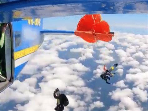 Skydiver dangles mid-air during skydiving in Australia