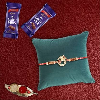 Cadbury Premium Swastik With Om Rakhi & 2 Pieces Dairy Milk Chocolates ...