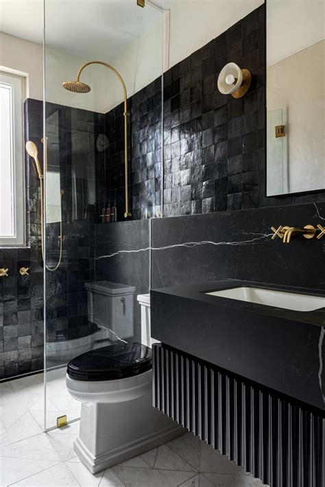 The Moody Black Bathroom Is In—And We’re Here for It | Architectural Digest