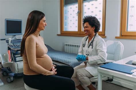Pregnant woman during examination at doctor office | Premium Photo
