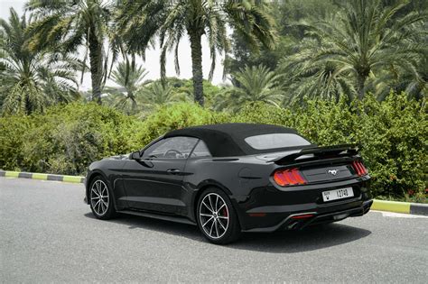 Rent Ford Mustang Black in Dubai - Convertible - Octane.Rent