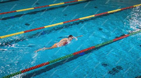 Premium Photo | Elite female swimmer during a front crawl swimming training