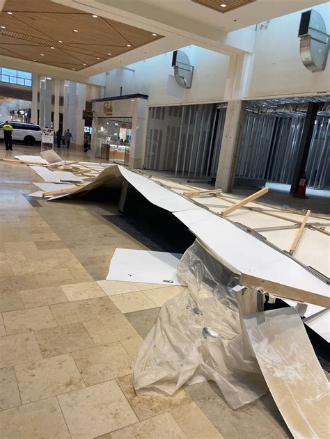 Video: Temporary wall to under-construction Zara falls over inside ...