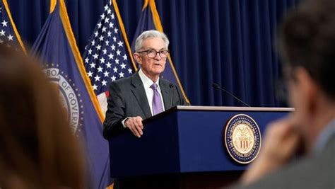 US Fed holds key rates elevated at two-decade high, Powell nods to ...