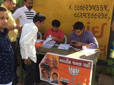 people catch video of who sit on table with BJP banner near voting ...