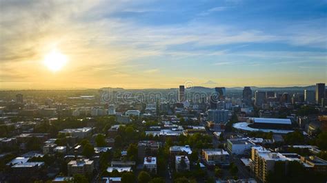 Aerial Sunrise Over Portland Cityscape with Mount Hood in Background ...