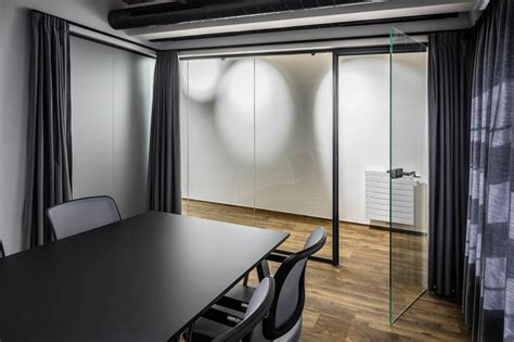 Modern glass partition with a historic vaulted ceiling | Partitions and ...