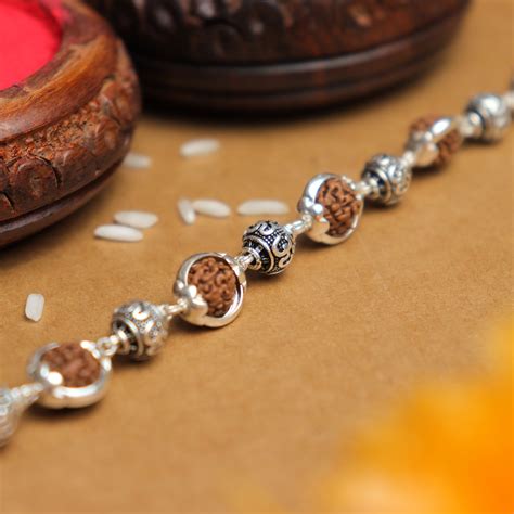 Buy Rudraksha Silver Rakhi For Rakshabandhan – Prinjal Jewels