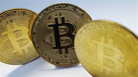 Bitcoin price falls from record highs to under $60,000; Ether retreats ...