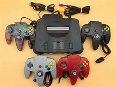 new n64 console n64 nintendo 64 console up to 4 new controllers cords new n64 console n64 nintendo 64 console up to 4 new controllers cords