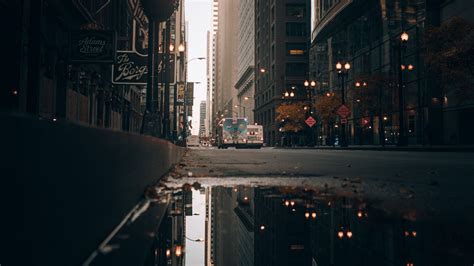 Download wallpaper 2560x1440 street, city, buildings, puddle ...