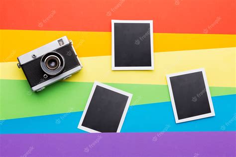 Rainbow pride flag with film camera and photos | Premium Photo