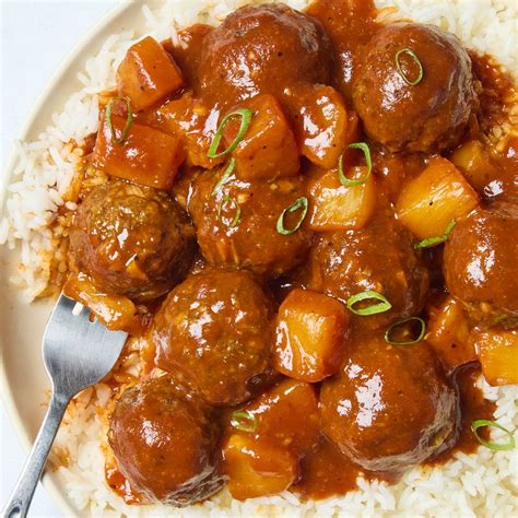 https://hips.hearstapps.com/hmg-prod/images/pineapple-bbq-meatballs-secondary-65aec8b72c8b0.jpg?crop=0.9994655264564404xw%3A1xh%3Bcenter%2Ctop&resize=980%3A%2A
